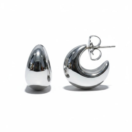 Orecchini Tempo A Tempo Shelly a mezzaluna chunky in acciaio 316L color argento lucido dal design moderno