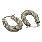Orecchini Tempo A Tempo in acciaio argentato con design a vortice intrecciato tridimensionale per donna