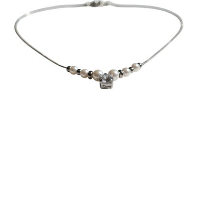 Tempo A Tempo women's necklace featuring synthetic pearls and a central faceted crystal on a stainless steel chain.
