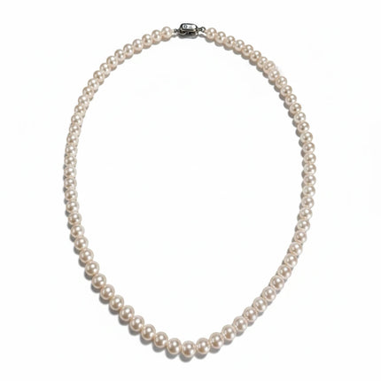 Tempo A Tempo Shelly necklace featuring pink glass pearls and a magnetic clasp with zirconia accents