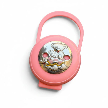 Tempo A Tempo pink plastic pacifier case with a silver-tone teddy bear emblem and integrated stroller handle