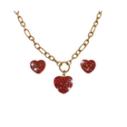 Tempo A Tempo gold-tone necklace and earrings set with red crystal heart pendants. Elegant and romantic.