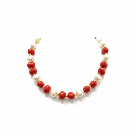 Tempo A Tempo necklace featuring alternating white shell powder pearls and red beads with gold-tone T-bar closure.