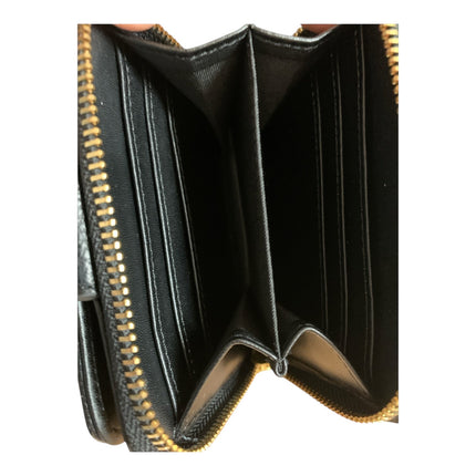 Tempo A Tempo Regina Schrecker black leather wallet interior with multiple card slots and a zippered coin compartment