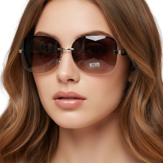 Tempo A Tempo rimless women's sunglasses with gradient brown lenses and a silver metal frame.