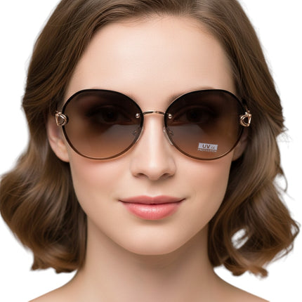 Tempo A Tempo women's oversized round semi-rimless sunglasses with rose gold metal frame and gradient brown UV protection lenses.