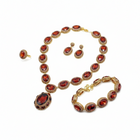 Tempo A Tempo vintage 4-piece ruby red crystal and gold-tone jewelry set with necklace, bracelet, earrings, and ring.