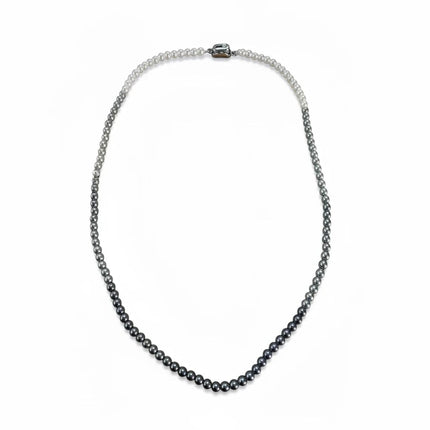 Tempo A Tempo Shelly necklace featuring a gradient of grey glass pearls and a stainless steel clasp