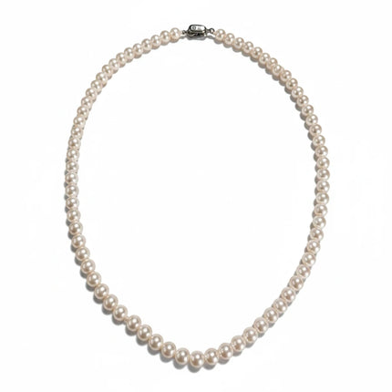 Tempo A Tempo Shelly necklace featuring pink glass pearls and a magnetic clasp with zircon accents