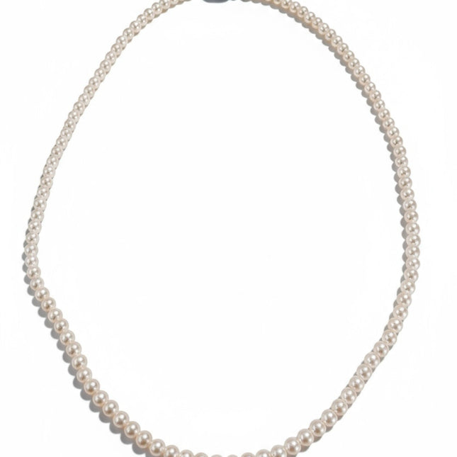 Tempo A Tempo Shelly necklace featuring pink glass pearls and a magnetic clasp with zircon accents