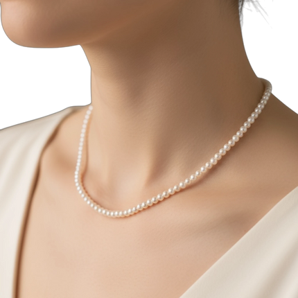 Tempo A Tempo Shelly necklace featuring delicate pink glass pearls worn around a woman's neck