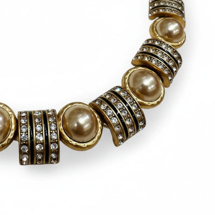 Tempo A Tempo Shelly vintage style necklace with gold pearls and sparkling crystal accents on a white background
