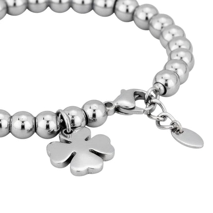 Tempo A Tempo silver-tone stainless steel beaded bracelet with a clover charm. Adjustable length with lobster clasp.