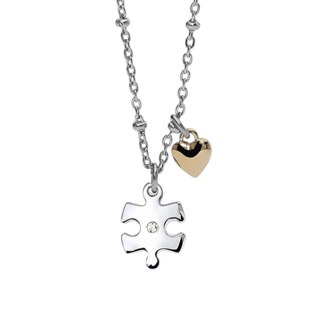 Tempo A Tempo silver and gold tone stainless steel puzzle piece necklace with a small heart charm and a crystal accent.