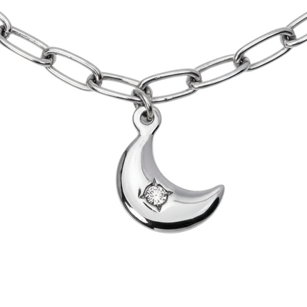 Tempo A Tempo silver-tone stainless steel chain bracelet with moon and star charms and white crystals.
