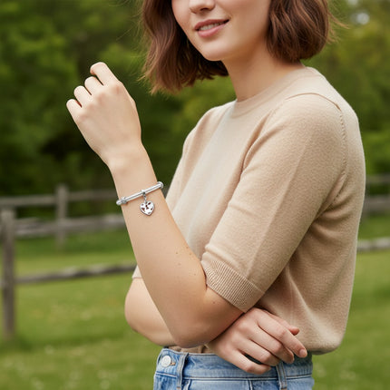 Tempo A Tempo silver-tone steel bracelet with clear resin heart charm and crystal accents.