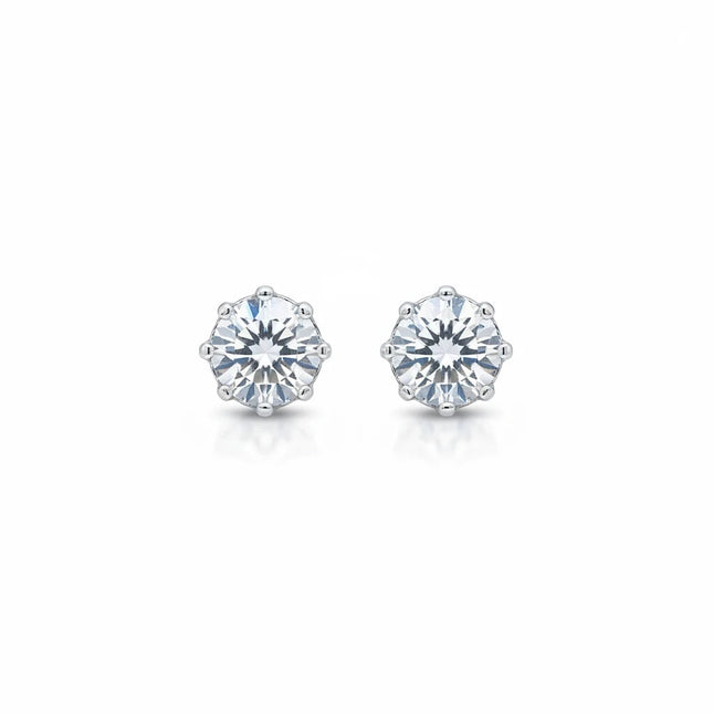 Tempo A Tempo 5mm sterling silver stud earrings featuring a round faceted clear stone in a classic six-prong setting.