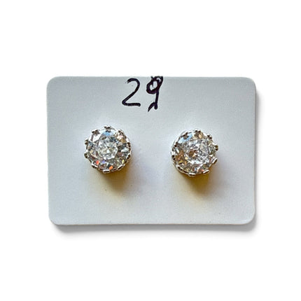 Tempo A Tempo 5mm sterling silver stud earrings with a clear faceted stone in a round setting on a display card.