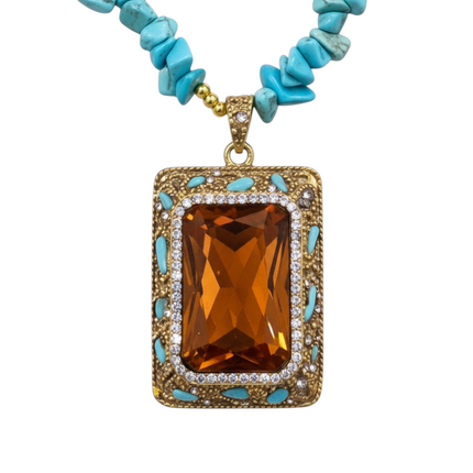 Tempo A Tempo turquoise chip necklace with rectangular amber crystal pendant and gold accents.