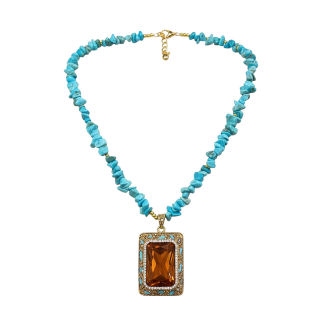 Tempo A Tempo turquoise chip necklace with rectangular amber crystal pendant and gold accents.