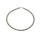 Tempo A Tempo unisex choker necklace with small green beads and silver-tone spacers, made of hypoallergenic 316L steel with a vintage, worn effect.