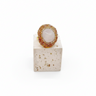 Tempo A Tempo adjustable gold-plated copper ring with white cabochon stone and champagne rhinestones, vintage style.