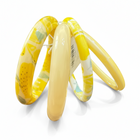 Tempo A Tempo set of 4 yellow resin bangles with a lemon print and solid coordinating colors. Perfect for summer.